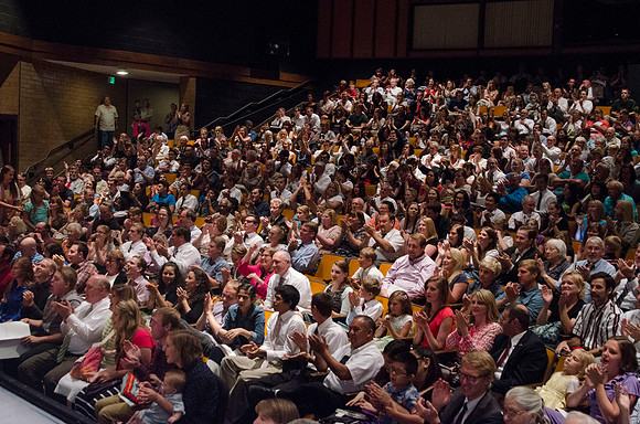 Families and friends applaud the BYU-Idaho graduates during convocation in the Snow Drama Theatre.