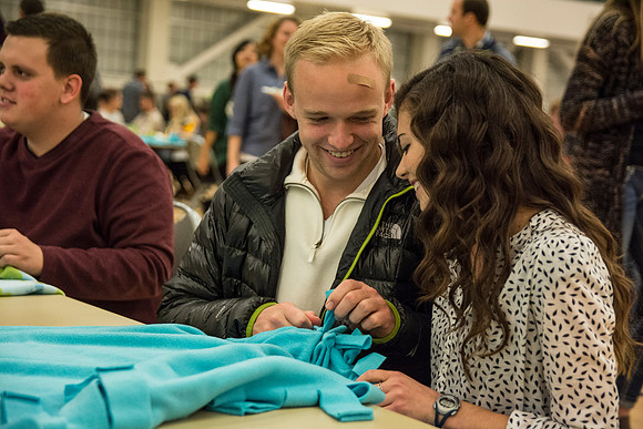 Students do a variety of service activies together with their dates.