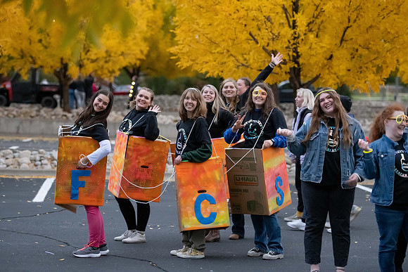 Students participate in the Spirit Week festivities that include a torch lighting and parade.