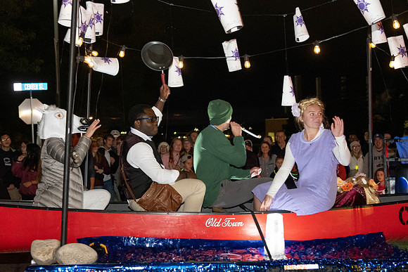 Students participate in the Spirit Week festivities that include a torch lighting and parade.