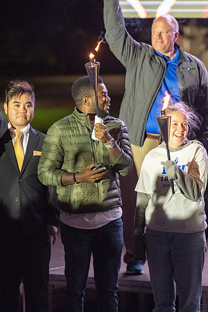 Students participate in the Spirit Week festivities that include a torch lighting and parade.