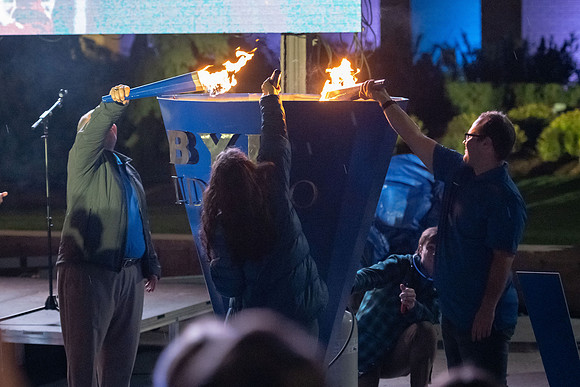 Students participate in the Spirit Week festivities that include a torch lighting and parade.