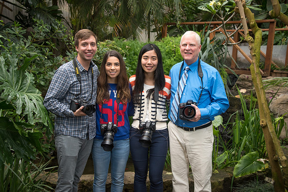 Mike Lewis and students Ericka Sanders, Cami Su, and Garrett Blanchard pose a photo in the Benson Greenhouse at the end of a great semester.