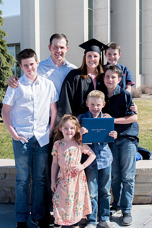 BYU-Idaho graduates with their family on compus.