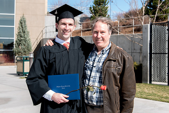BYU-Idaho graduates with their family on compus.