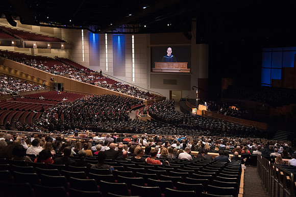Graduates standing in Line Commencement