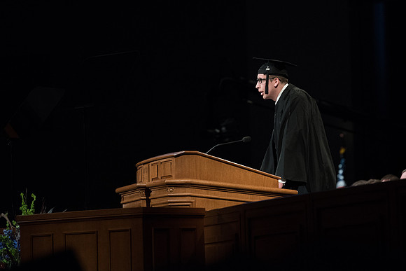 BYU-Idaho Winter Semester Graduation. A graduate sharing a scripture during Commencement. Apr 2018