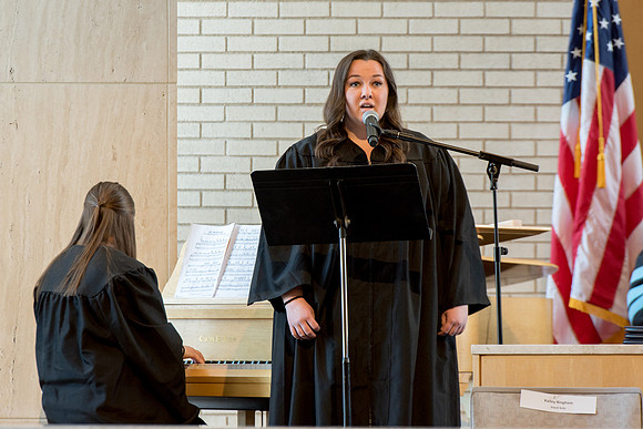 Kailey Anona Bingham performs the musical number at the College of Eduation and Human Development convocation.