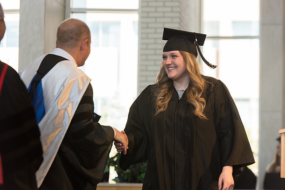 BYU-Idaho students graduate from College of Eduation and Human Development convocation receive their diplomas.