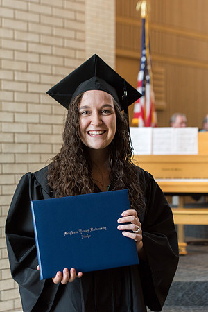 BYU-Idaho students graduate from College of Eduation and Human Development convocation receive their diplomas.