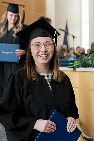 BYU-Idaho students graduate from College of Eduation and Human Development convocation receive their diplomas.