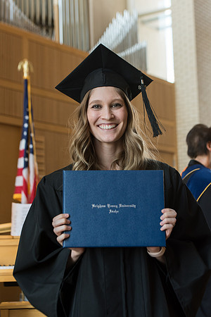 BYU-Idaho students graduate from College of Eduation and Human Development convocation receive their diplomas.