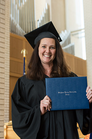 BYU-Idaho students graduate from College of Eduation and Human Development convocation receive their diplomas.