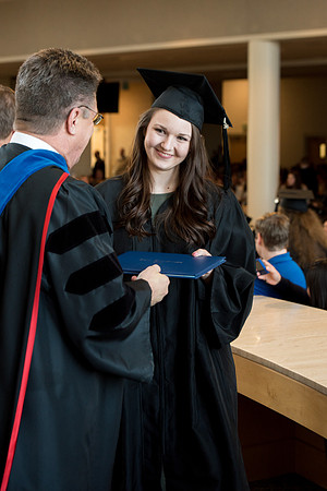BYU-Idaho students graduate from College of Eduation and Human Development convocation receive their diplomas.