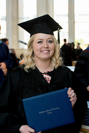 BYU-Idaho students graduate from College of Eduation and Human Development convocation receive their diplomas.