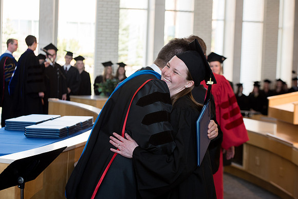 BYU-Idaho students graduate from College of Eduation and Human Development convocation receive their diplomas.