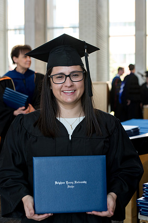 BYU-Idaho students graduate from College of Eduation and Human Development convocation receive their diplomas.