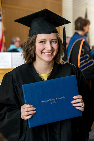 BYU-Idaho students graduate from College of Eduation and Human Development convocation receive their diplomas.