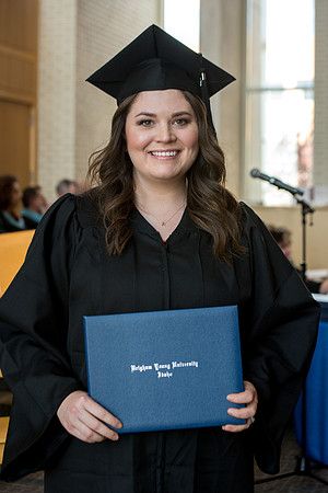 BYU-Idaho students graduate from College of Eduation and Human Development convocation receive their diplomas.