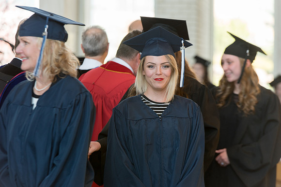 BYU-Idaho students graduate from College of Eduation and Human Development convocation receive their diplomas.