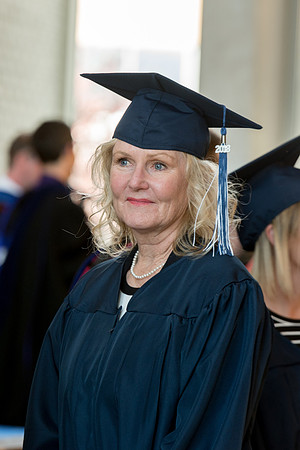 BYU-Idaho students graduate from College of Eduation and Human Development convocation receive their diplomas.