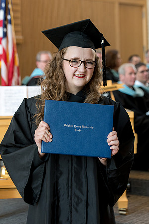 BYU-Idaho students graduate from College of Eduation and Human Development convocation receive their diplomas.