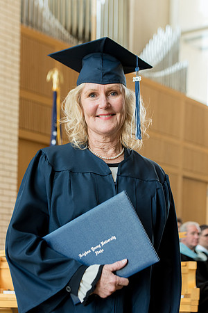 BYU-Idaho students graduate from College of Eduation and Human Development convocation receive their diplomas.