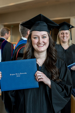 BYU-Idaho students graduate from College of Eduation and Human Development convocation receive their diplomas.