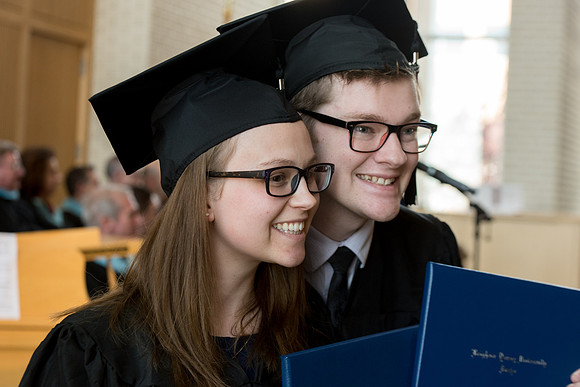 BYU-Idaho students graduate from College of Eduation and Human Development convocation receive their diplomas.