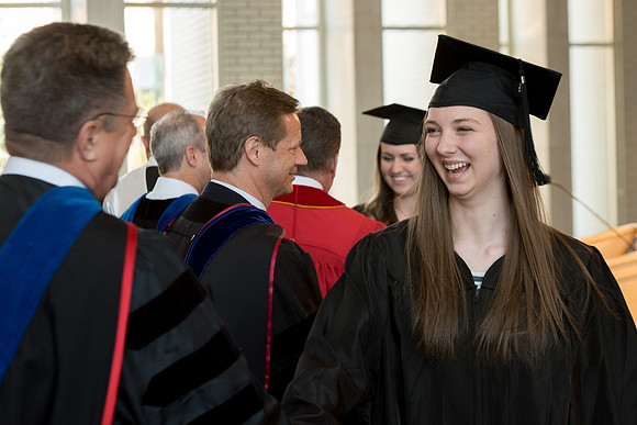 BYU-Idaho students graduate from College of Eduation and Human Development convocation receive their diplomas.