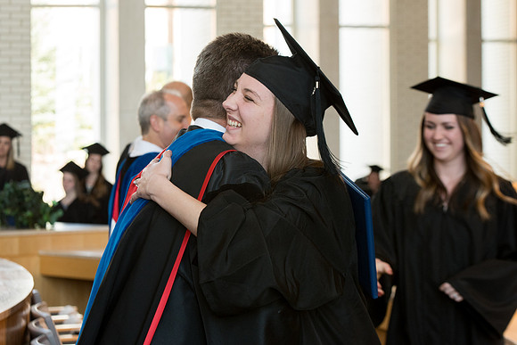 BYU-Idaho students graduate from College of Eduation and Human Development convocation receive their diplomas.