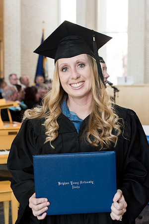 BYU-Idaho students graduate from College of Eduation and Human Development convocation receive their diplomas.