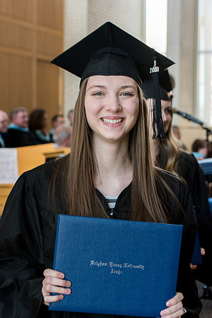 BYU-Idaho students graduate from College of Eduation and Human Development convocation receive their diplomas.