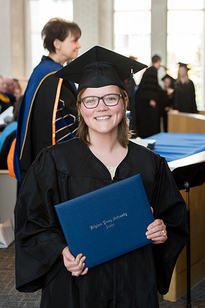 BYU-Idaho students graduate from College of Eduation and Human Development convocation receive their diplomas.