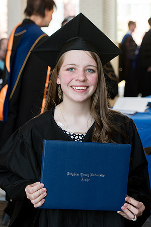 BYU-Idaho students graduate from College of Eduation and Human Development convocation receive their diplomas.