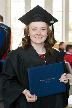 BYU-Idaho students graduate from College of Eduation and Human Development convocation receive their diplomas.