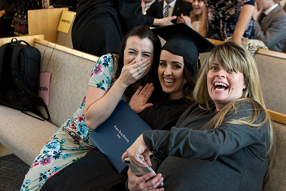 BYU-Idaho students graduate from College of Eduation and Human Development convocation receive their diplomas.