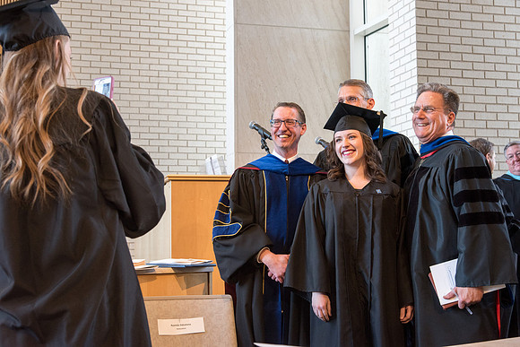 BYU-Idaho students graduate from College of Eduation and Human Development convocation receive their diplomas.