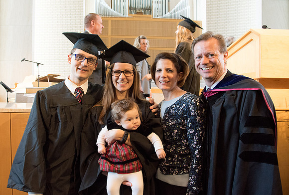 Brother Eaton with his family at College of Eduation and Human Development convocation.