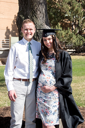 BYU-Idaho graduates with their family on campus.