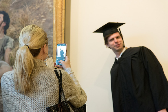 Graduates meet in the I-Center Courts for Processional.