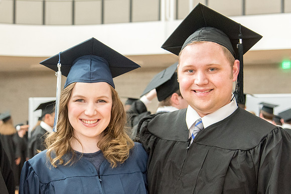 Graduates meet in the I-Center Courts for Processional.
