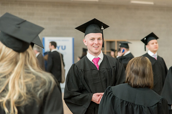 Graduates meet in the I-Center Courts for Processional.