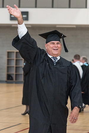 Graduates meet in the I-Center Courts for Processional.