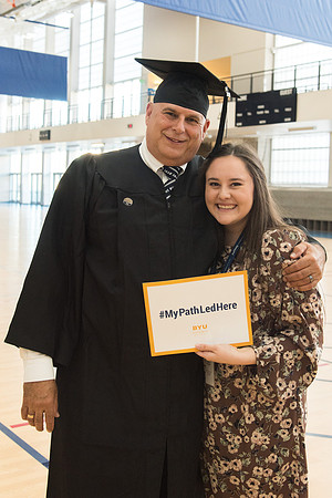 Graduates meet in the I-Center Courts for Processional.