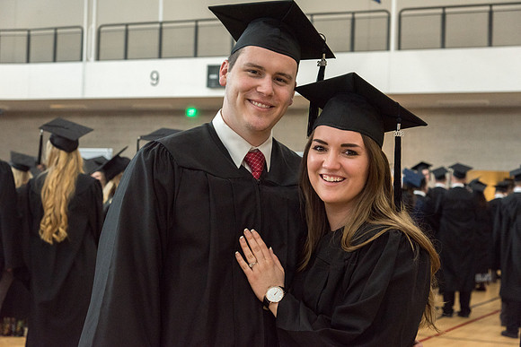 Graduates meet in the I-Center Courts for Processional.