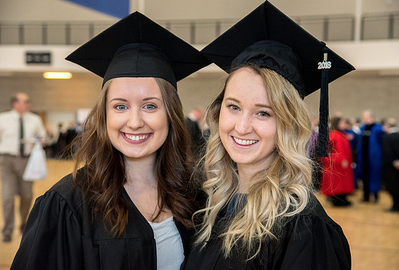 Graduates meet in the I-Center Courts for Processional.