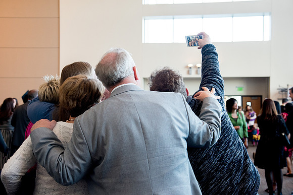 BYU-Idaho graduates with their family after the commencement service.