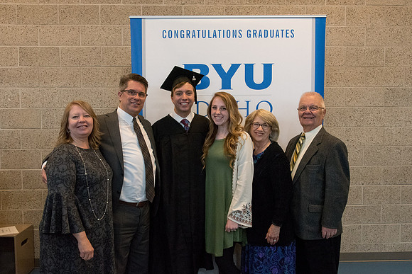 BYU-Idaho graduates with their family after the commencement service.