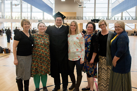 BYU-Idaho graduates with their family after the commencement service.